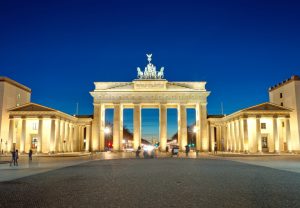The illiminated Brandenburg Gate at dawn